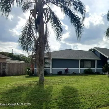 Rent this 3 bed house on 658 Castaways Street Northeast in Palm Bay, FL 32907