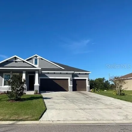 Rent this 4 bed house on 3061 Mela Court in Beacon Square, Pasco County