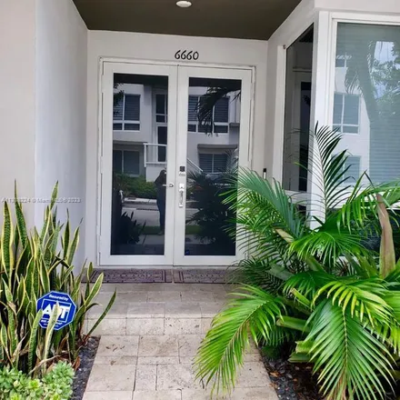 Rent this 4 bed apartment on 6661 Northwest 105th Court in Doral, FL 33178