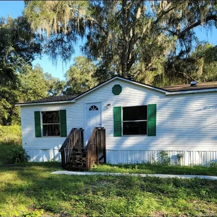 Buy this 3 bed house on 3129 Northeast 160th Place in Marion County, FL 32113