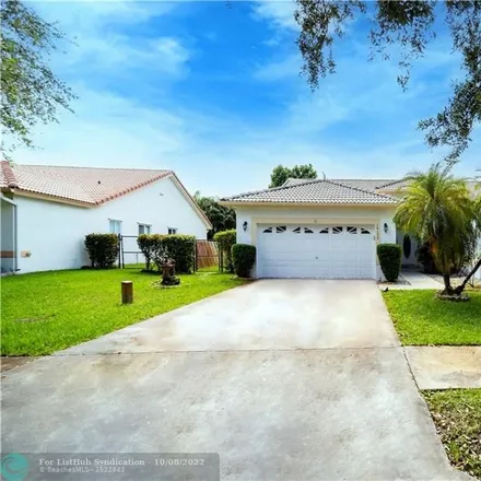 Buy this 4 bed house on 10152 Northwest 23rd Street in Coral Springs, FL 33065