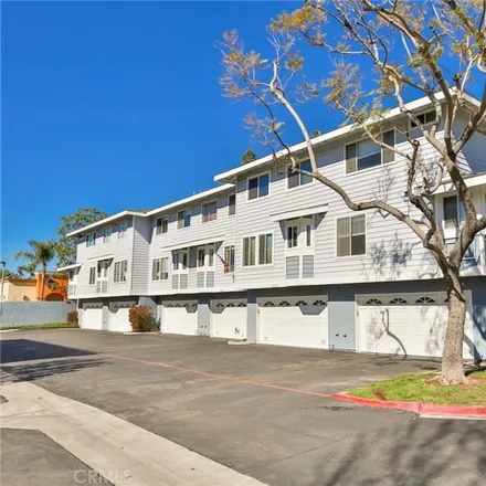 Buy this 3 bed townhouse on 8125 Surfline Drive in Huntington Beach, CA 92648