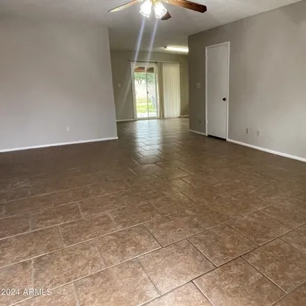 Rent this 3 bed house on 2401 West Jacinto Avenue in Mesa, AZ 85202
