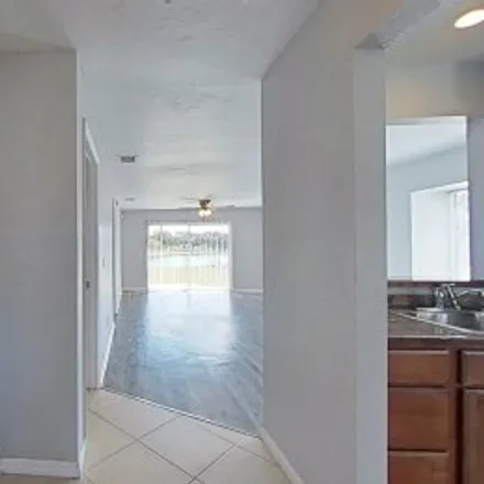 Rent this 2 bed apartment on 11523 Thurston Way in Whisper Lakes, Orlando