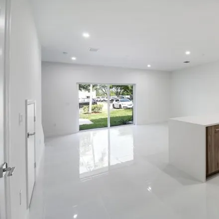 Rent this 3 bed townhouse on Crystal Way in Delray Beach, FL