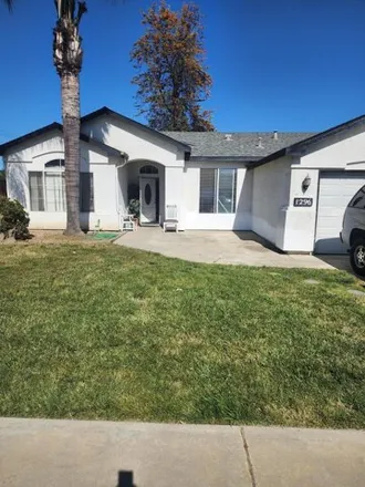 Buy this 4 bed house on 1630 West Prosperity Avenue in Tulare, CA 93274