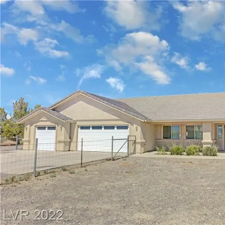 Buy this 3 bed house on 1650 West Huckleberry Street in Pahrump, NV 89048
