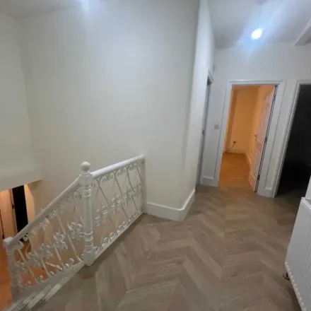 Rent this 4 bed apartment on Dani Barbers in 404 Barking Road, London