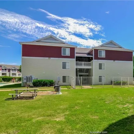 Rent this 4 bed condo on 523 Southwest Parkway in College Station, TX 77840