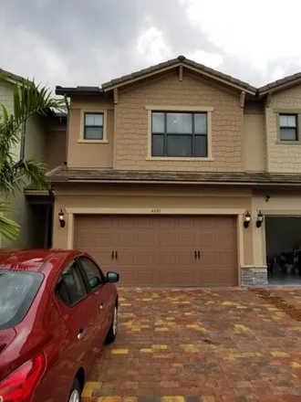 Rent this 3 bed townhouse on 8566 Eventing Street in Palm Beach County, FL 33467