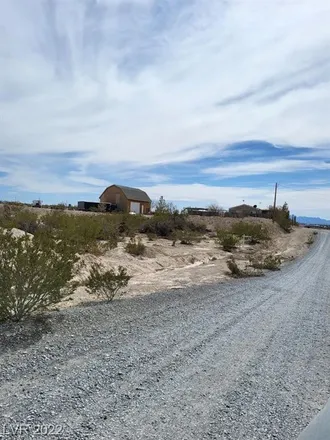 Buy this 4 bed house on 1261 North Rockafeller Drive in Pahrump, NV 89060