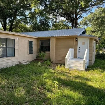 Buy this 4 bed house on 124 NW 19th Ave in Ocala, Florida