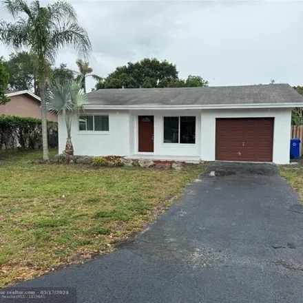 Buy this 3 bed house on 6331 Northwest 34th Avenue in Palm Aire, Fort Lauderdale