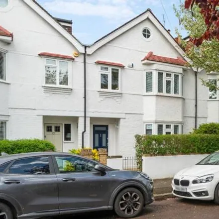 Buy this 4 bed townhouse on 23 Wallorton Gardens in London, SW14 8DX