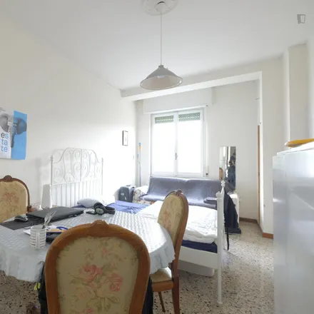 Rent this 4 bed room on The Barber Shop in Viale Arrigo Boito, 70