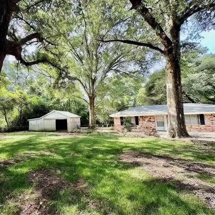 Buy this 2 bed house on 407 W Live Oak St in Woodville, Texas