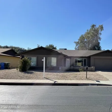 Rent this 4 bed house on 1831 West Evans Drive in Phoenix, AZ 85023