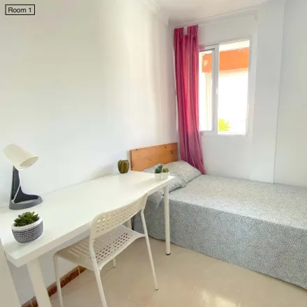 Rent this 4 bed room on Calle El Pedroso in 41008 Seville, Spain