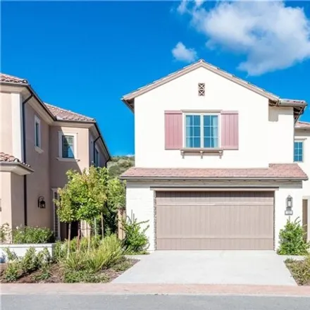 Rent this 4 bed house on 145 Statura in Irvine, CA 92602