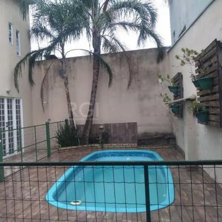 Buy this 3 bed house on Rua Conselheiro Brusque in Jardim Itu, Porto Alegre - RS