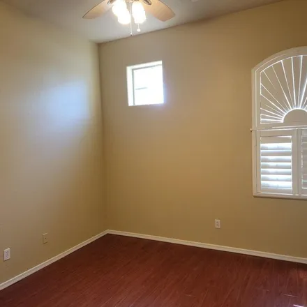 Rent this 4 bed apartment on 3750 South Cupertino Drive in Gilbert, AZ 85297
