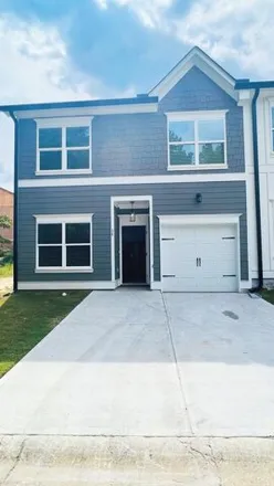 Rent this 4 bed townhouse on Towne Villas Drive in Jasper, Pickens County
