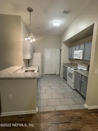 Rent this 2 bed condo on 7920 Merrill Road in Jacksonville, FL 32277