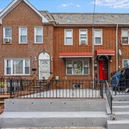 Buy this 3 bed house on 25-37 97th Street in New York, NY 11369