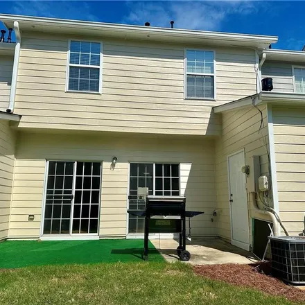 Rent this 3 bed townhouse on 2266 Leicester Way in Candler-McAfee, GA 30316