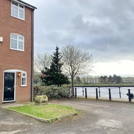 Rent this 4 bed townhouse on Merchants Quay in Salford, M50 3XG