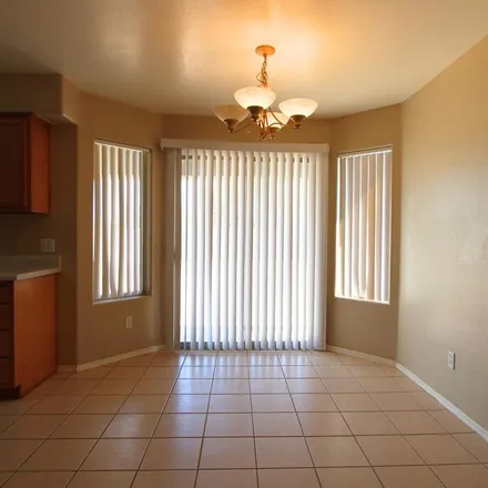 Rent this 3 bed apartment on 15537 South Moon Valley Road in Arizona City, Pinal County