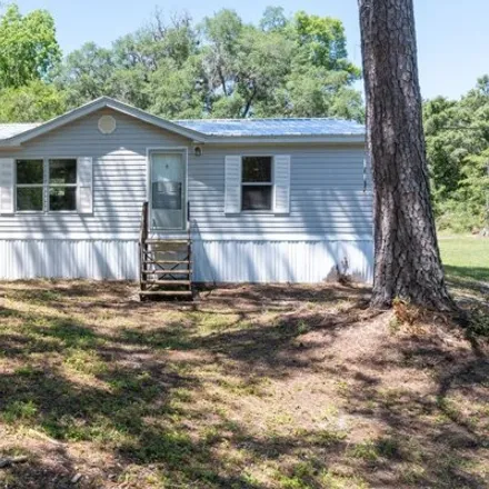 Buy this studio apartment on 9710 102nd Street in Suwannee County, FL 32060