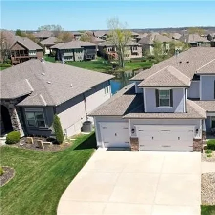 Buy this 5 bed house on 14717 Fairway Street in Leawood, KS 66224