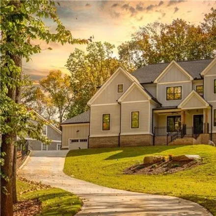 Buy this 5 bed house on Misty Oaks Drive Northeast in Gwinnett County, GA 30519