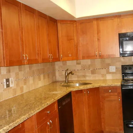 Rent this 3 bed apartment on 3995 Village Drive in Kingsland, Delray Beach