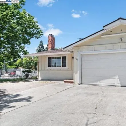 Buy this 4 bed house on 1703 Chaucer Drive in San Jose, CA 95116