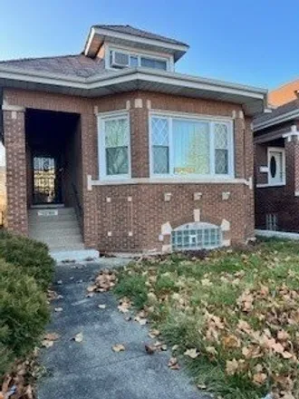 Buy this 3 bed house on 9044 South Racine Avenue in Chicago, IL 60620