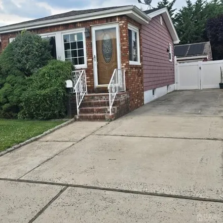 Buy this 3 bed house on 65 Hermann St in Carteret, New Jersey