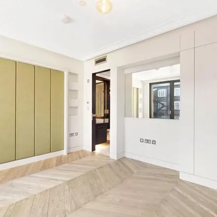 Rent this 4 bed townhouse on The Fitness Mosaic in Nordic Mews, Primrose Hill