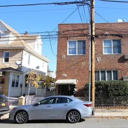 Buy this 9 bed townhouse on 2067 West 7th Street in New York, NY 11223