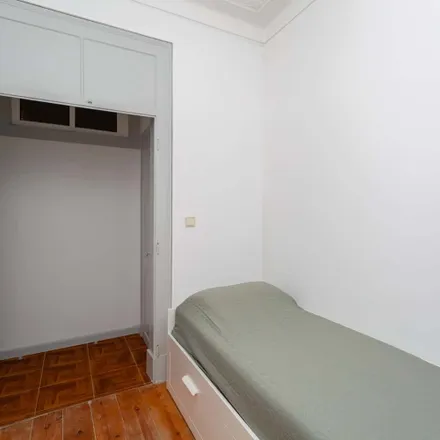 Rent this 5 bed room on Airbnb in Rua do Carrião, 1150-251 Lisbon