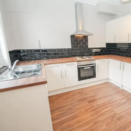 Rent this 4 bed townhouse on Back Stanmore Street in Leeds, LS4 2RU