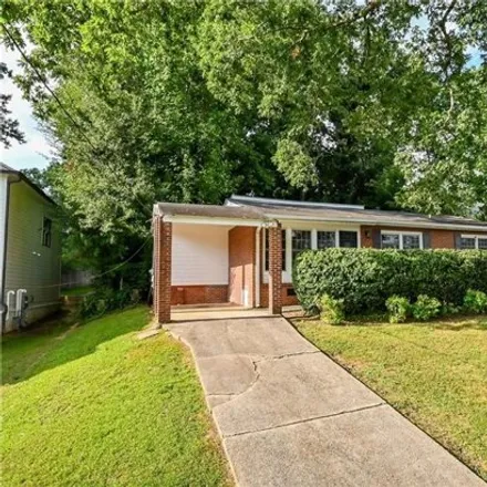 Rent this 3 bed house on 2456 Drew Valley Road Northeast in Brookhaven, GA 30319