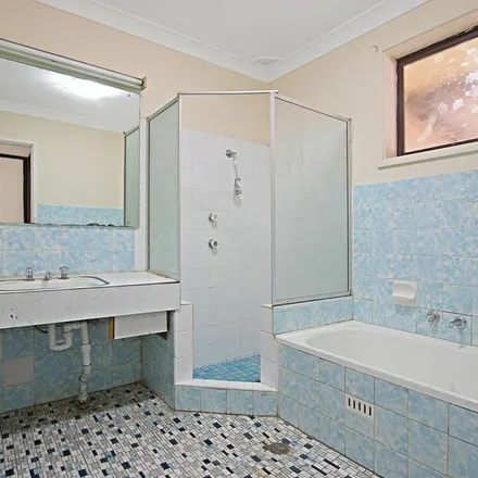 Rent this 3 bed apartment on Corben Avenue in Moorebank NSW 2170, Australia