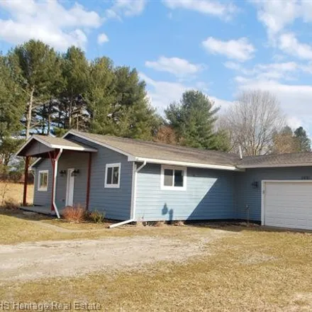 Buy this 4 bed house on 5390 West Coon Lake Road in Marion Township, Livingston County