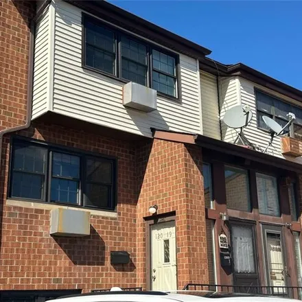 Rent this 3 bed house on 120-19 Cove Court in New York, NY 11356