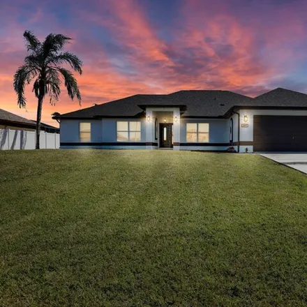 Buy this 4 bed house on 373 Northwest 27th Avenue in Cape Coral, FL 33993