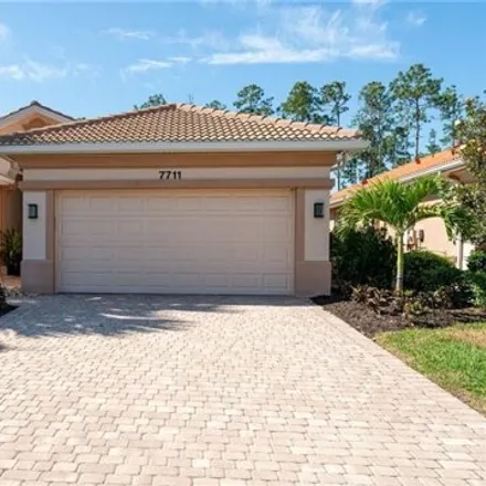 Rent this 3 bed house on 7709 Martino Circle in Collier County, FL 34112