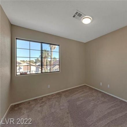 Rent this 4 bed house on 2717 Eagle Springs Court in Las Vegas, NV 89117