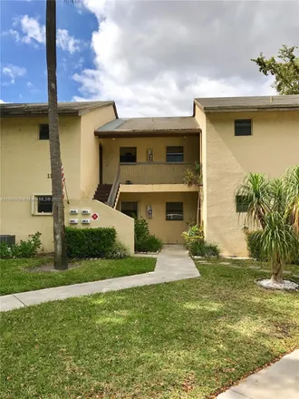 Rent this 2 bed condo on 3813 Cocoplum Circle in Coconut Creek, FL 33063